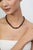 Add a warm, earthy touch to your jewelry collection with this distinctive 16.75-inch beaded strand necklace, featuring 124...