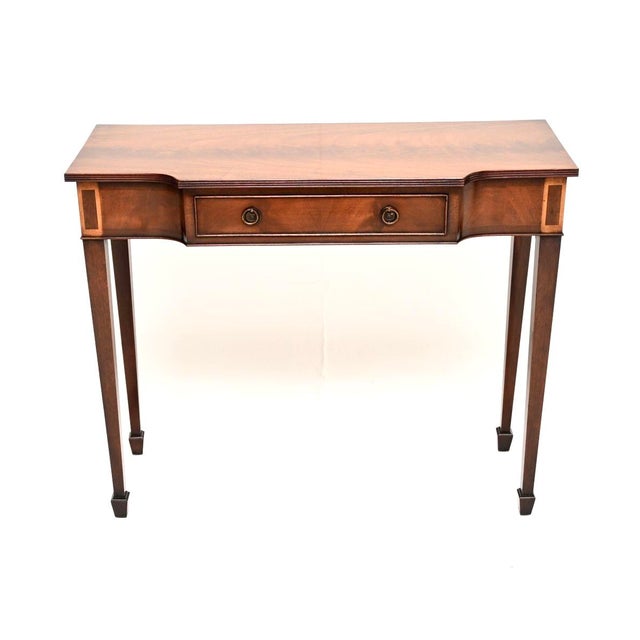 A smart and useful antique Georgian style inlaid console table. This was made in England, we would date it to around the...