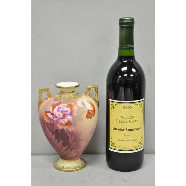 Antique Nippon Hand Painted Porcelain Small Pink Floral Vase w Gold Gilt Twin Handles. Circa Early 20th Century....