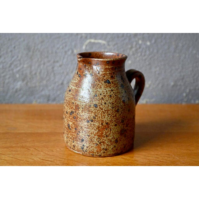 This little pitcher or pitcher in pyrite stoneware is touchingly simple. We love its broad, rustic and essential shape,...