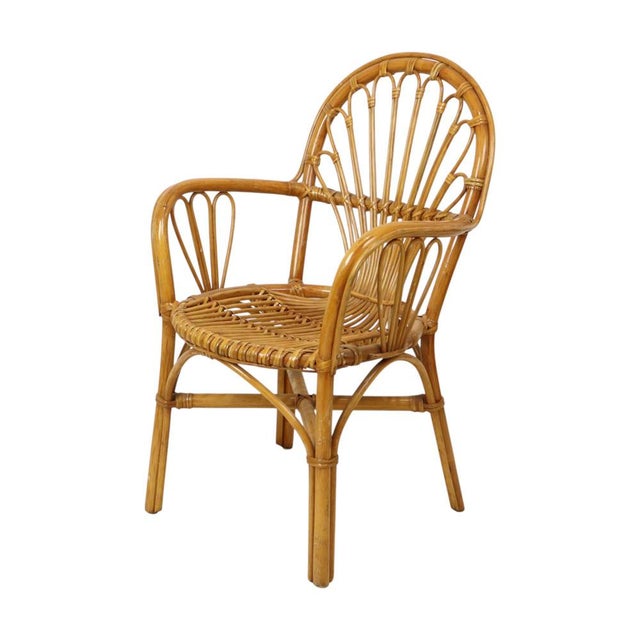 Vintage chair, armchair made of woven rattan, Bohemian design from the 1970s. High-quality craftsmanship, very solid and...