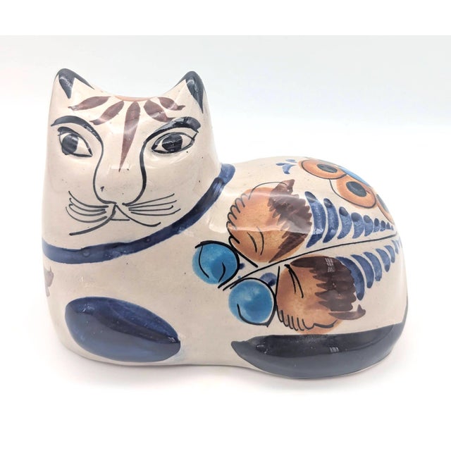 Offered is a vintage 1970s handcrafted and burnished clay cat figurine from Tonalá, in Jalisco, Mexico, a province...
