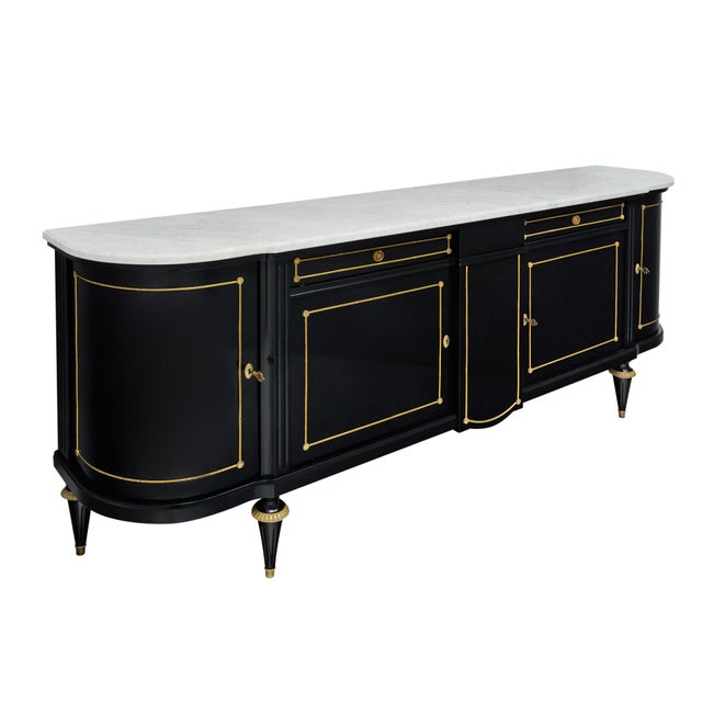 Buffet or enfilade from France made in the Louis XVI style. This piece is made of solid wood construction, primarily...