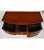 An elegant 19th century English mahogany sideboard distinguished by its graceful serpentine front, rich figured mahogany...