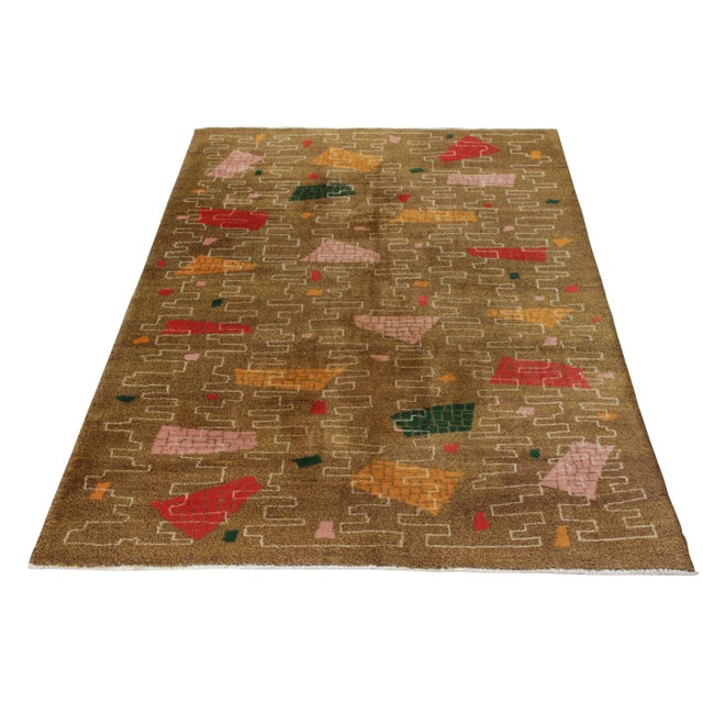 Hand-knotted in wool, this 5x8 vintage Turkish Art Deco rug joins Rug & Kilim’s Mid-Century Pasha Collection. This...