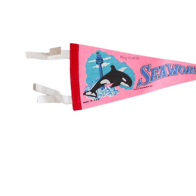 Vintage Seaworld felt flag pennant circa 1970. A pink, red, blue, and white mid-century souvenir from SeaWorld in Orlando,...