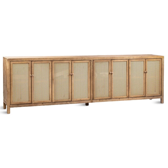 This striking long 8-door sideboard combines the warmth of reclaimed pine with the natural texture of woven rattan for an...