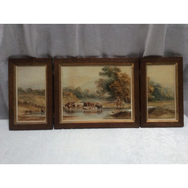 Great looking landscape watercolor in three sections. Possibly English but not for sure. The frame is oak with a Giltwood...