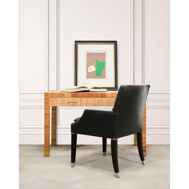 A labeled and signed Organic Modern-style rattan cane wrapped writing table desk designed by Billy Baldwin for Bielecky...