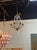 Beautiful petite French bronze and crystal chandelier. A sparkling beauty for a small space! This fixture is wired and...