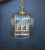 Hexagon shaped lucite panels with cascading waterfall edge top. Etching of six Irises around perimeter with six interior...
