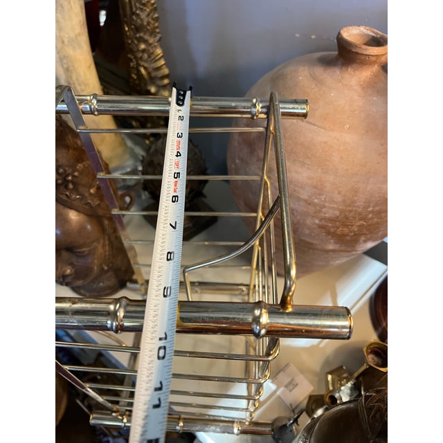Up for consideration is a beautiful vintage brass MCM magazine rack. This would look lovely in your home and it is a great...