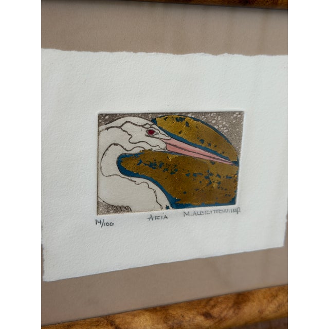 A charming limited edition etching titled “Aria”, depicting a stylized egret rendered in delicate linework with subtle...