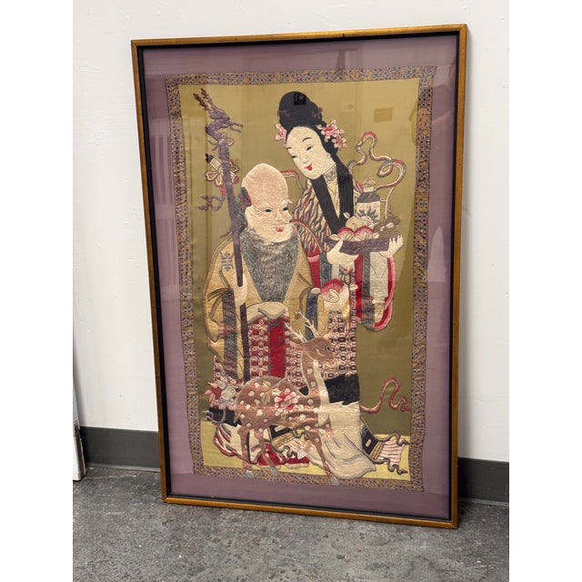 Design Plus Gallery presents a Vintage Framed Shou Lao + Deer Silk Embroidery. The embroidery is depicting Shou Lao, the...
