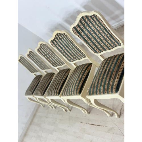 For sale is a set of five beautiful antique Chippendale-style chairs, made around 1920. The chairs are distinguished by...