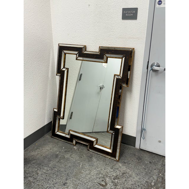 Design Plus Gallery presents a Custom Art Deco Revival Style Wall Mirror. This geometric mirror is defined by a stepped,...