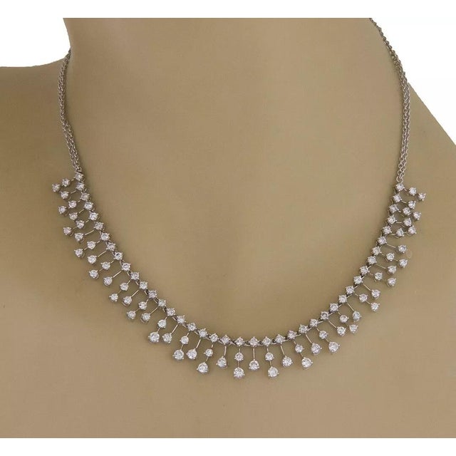 This lovely choker necklace is crafted from 14k white gold featuring 6 inches long centerpiece with prong set diamonds and...