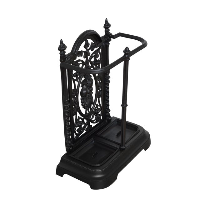 This exceptionally attractive hall stand combines practical utility with the fine artistry of late 19th-century ironwork....