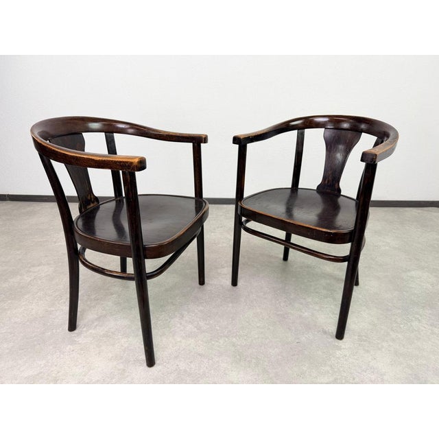 An exceptional and rare pair of early 20th-century art deco bentwood armchairs (Model A 967/F), designed circa 1904–1906...