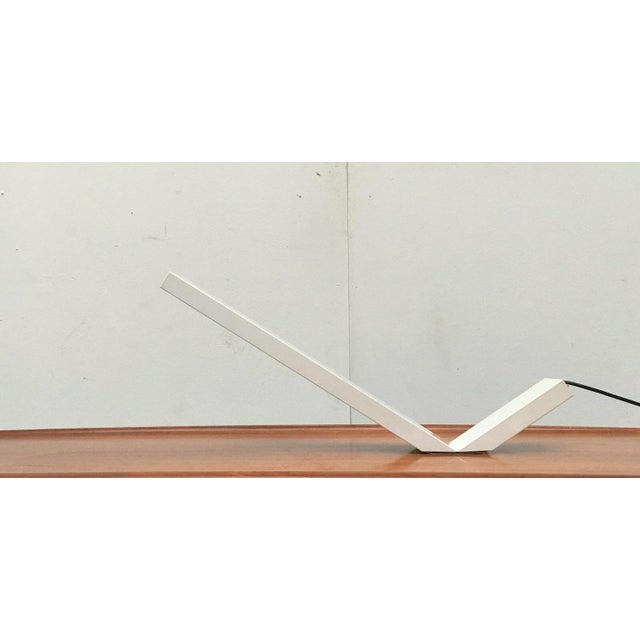 Rare table lamp from the Italian manufacturer Eleusi based on a design by Marco Zotta from the 80s. The shape of this lamp...