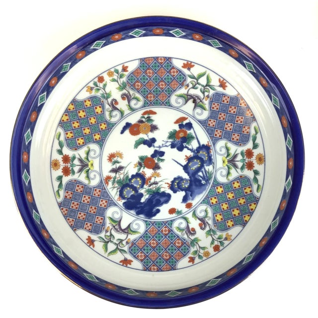 Gorgeous large hand turned porcelain bowl. The colors are so sharp on this beauty. Part of the artwork is printed, very...