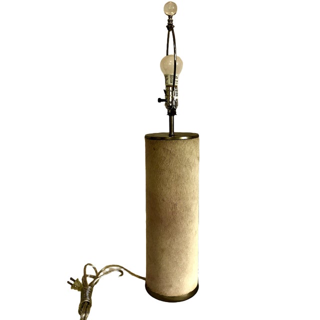 This distinctive pair of mid-to-late 20th-century cylinder table lamps combines organic textures with mid-century modern...