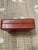Listed is a vintage Italian burgundy leather box with an embossed gold fleur-de-lis design. It is a storage box perfect...