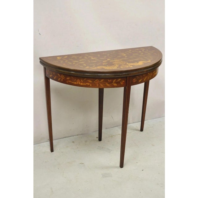 Antique Dutch Marquetry Inlay Flip Top Demilune Round Console Game Table. Item features stunning floral and figural...