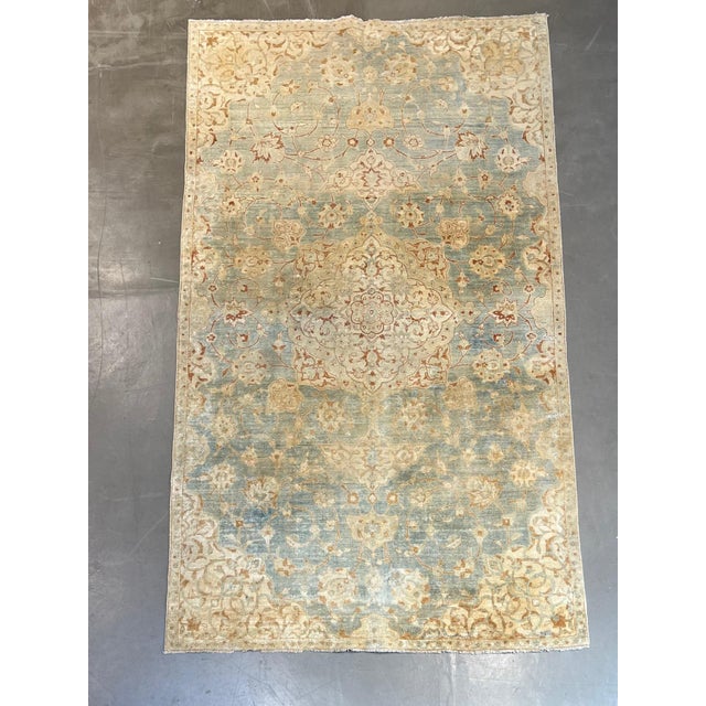 Beautiful antique rug in fantastic soft colors