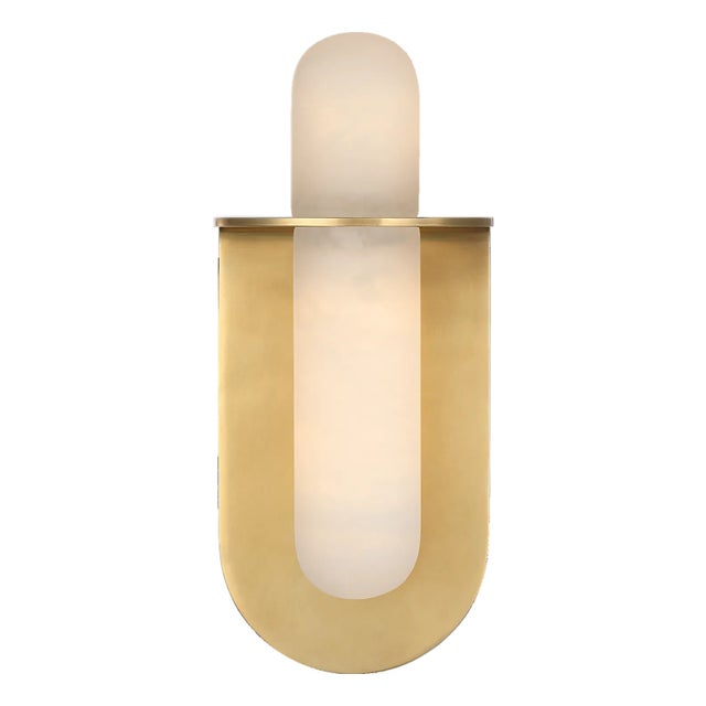Kelly Wearstler for Visual Comfort Signature Fosse 11" Invertable Offset Oval Sconce in Antique-Burnished Brass with Alabaster For Sale