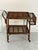 Made in Italy bamboo bar trolley in the 1950s Detail for the protruding bottle holder. Intact and in good condition. Small...
