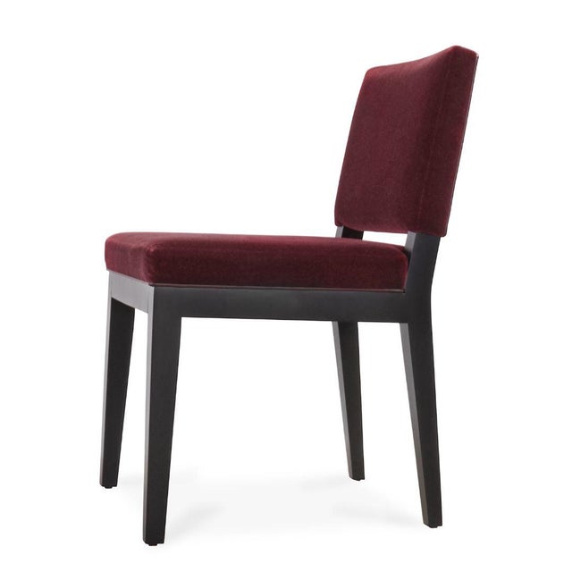 The Holly Hunt Studio Luna Dining Chairs embody quiet luxury with a refined, tailored presence. Upholstered in rich...
