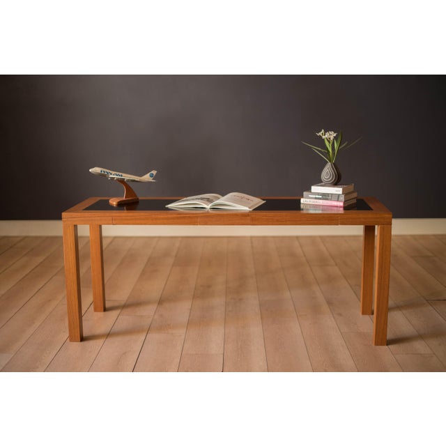 Mid century modern console table manufactured by Centrum Mobler, Denmark circa 1970's. Includes two seamless dovetail...