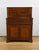 This mahogany English secretary desk is an elegant and functional piece of furniture. It opens with a drawer which...