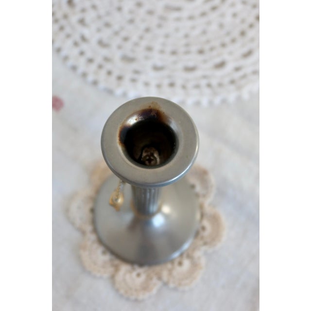 Add a touch of elegance to your interior decor with a pretty vintage candle holder in silver and gold metal. - Material:...