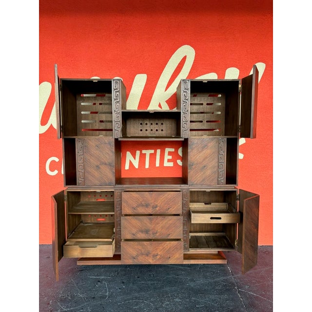 Really unique wall unit seemingly done in the manner of the popular United line that possesses the same tiki...