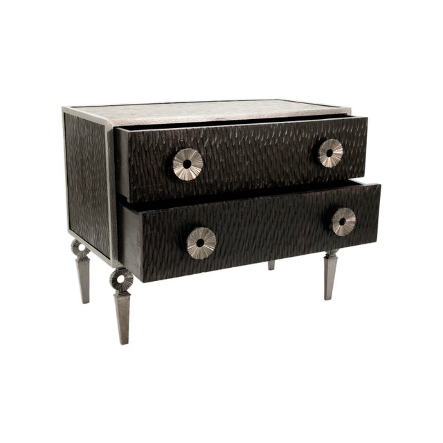 The Global Views Silver Framed Artisan Two Drawer Bedroom Chest brings together refined glamour and sculptural texture in...