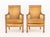 Pair of Restauration Style Fruitwood Bergeres, with golden velvet upholstery and carved rosette motif. 36.25" H x 25" W x...