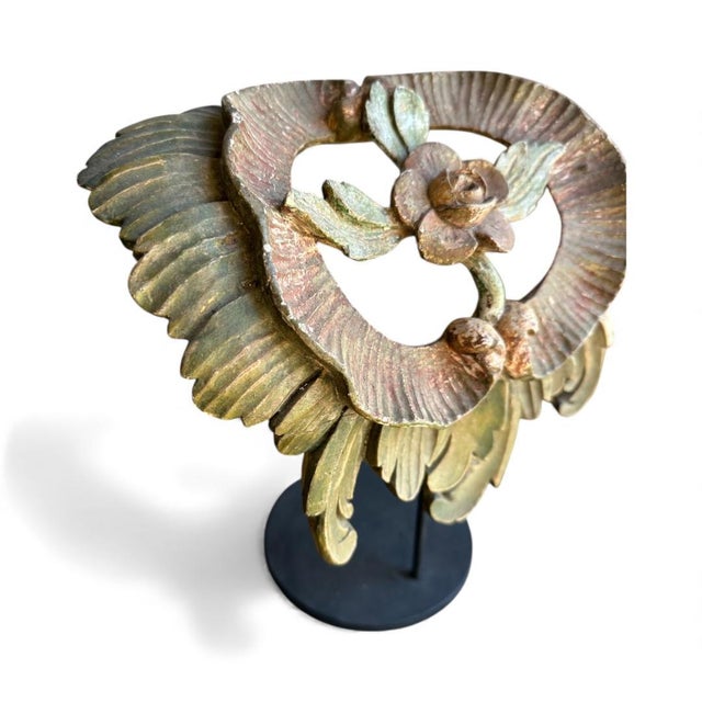 Nice piece for dispaly on a table or shelf. Hand painted and carved wood.