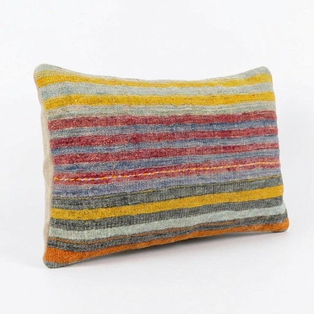 This beautiful 14'' x 20'' hand-woven Kilim pillow cover was made from an authentic Turkish kilim. The traditional flat-...