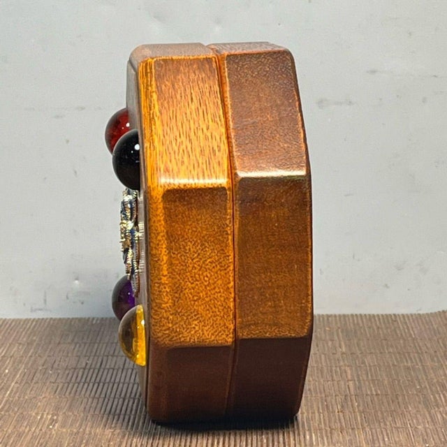 Beautiful vintage octagonal storage box crafted from solid pearwood. The lid is ornately decorated with a central...