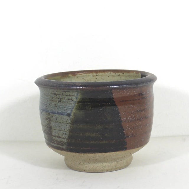 Beautiful and very useful handmade vintage speckled stoneware bowl in brown, blue and black. Bowls like this are so...