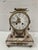 Three-piece louis xvi-style marble and chiseled bronze clock clock decorated with a bow and quiver beautiful chiseled...