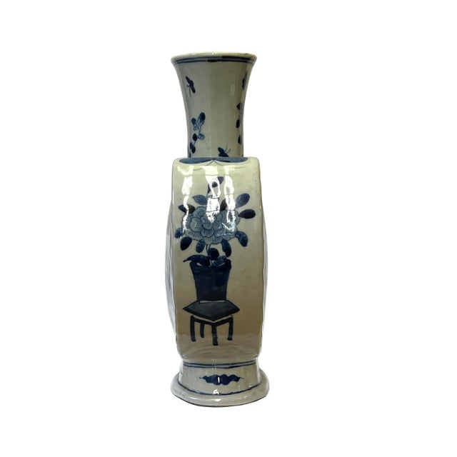 This is a Chinese decorative porcelain vase in a Blue and White color finish. The theme is an oriental people scenery...