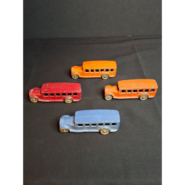 Presenting an exceptional pre-war group of four (4) authentic Tootsietoy No. 4651 Fageol Safety Coach buses, manufactured...