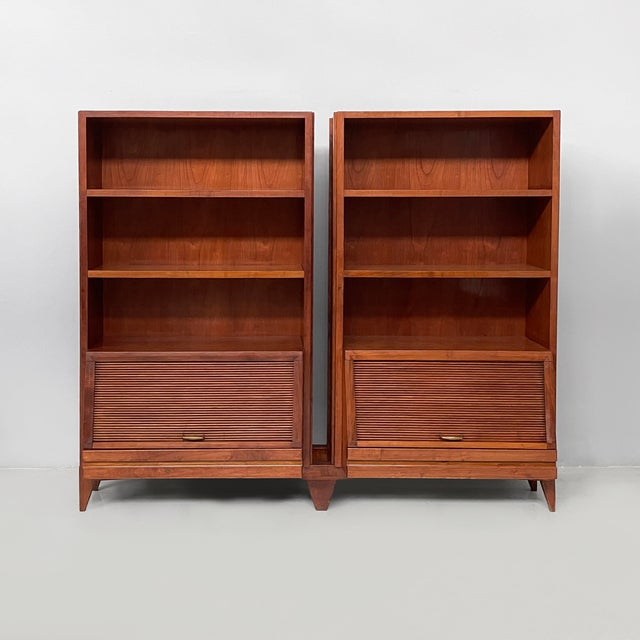 Italian mid-century modern sideboard in wood, 1960s Sideboard composed of two modules, made entirely of wood. Each module...