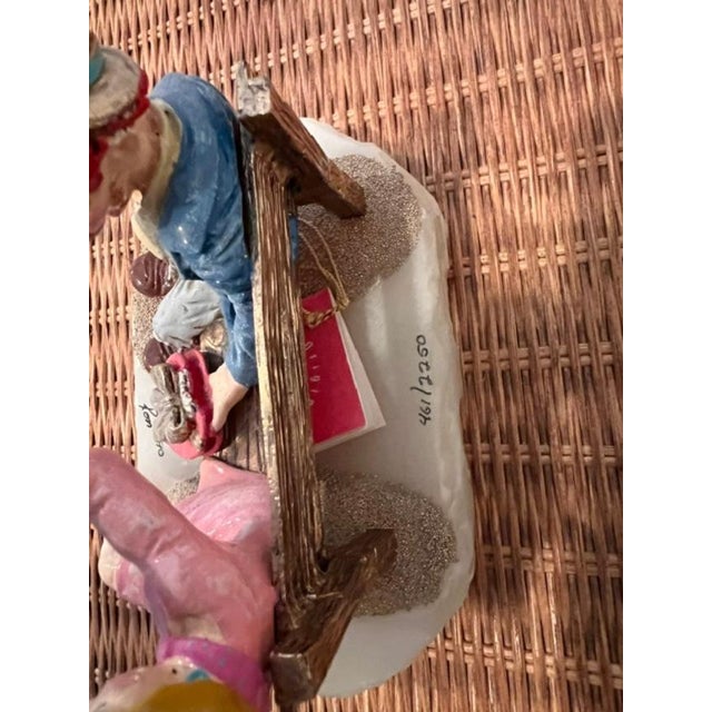 This is a vintage handcrafted figurine by artist Ron Lee, dated 1990, as indicated by the signature on the base. This...