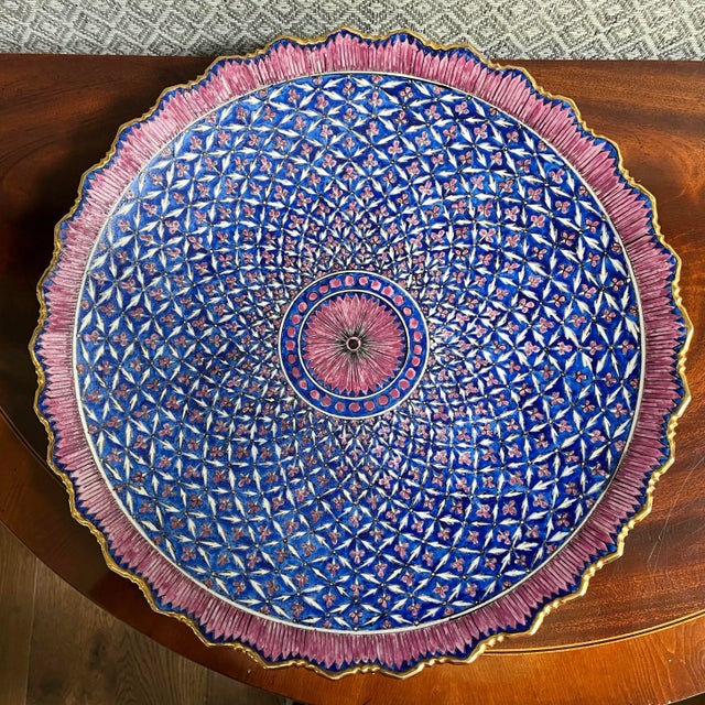 Exquisite large oriental ceramic plate with matching polished brass stand. Hand-painted in brilliant shades of blue and...