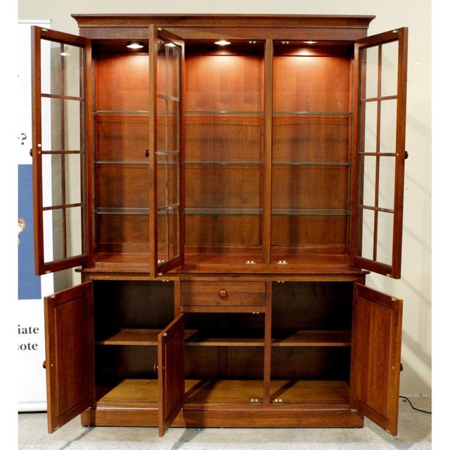 This piece is crafted in solid cherry with a warm, even finish that highlights the natural grain. The upper section...
