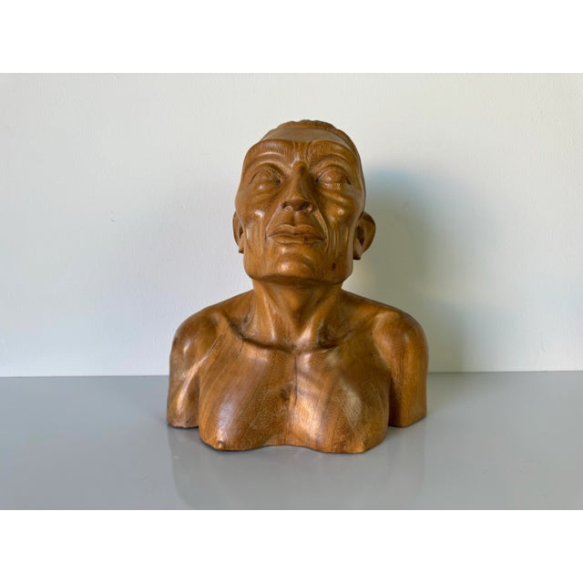 Up for sale is a wonderful Vintage art hand carved wooden bust - head sculpture of an Asian Man. This lovely sculpture is...